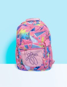 Mochila Totto para mujeres con diseño geométrico retro vibrante, perfecta para escuela, universidad y uso diario juvenil.