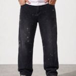 Pantalón baggy Royal Spirit con perlas negras y detalles brillantes, estilo moderno y urbano, disponibles en varias tallas para hombre.