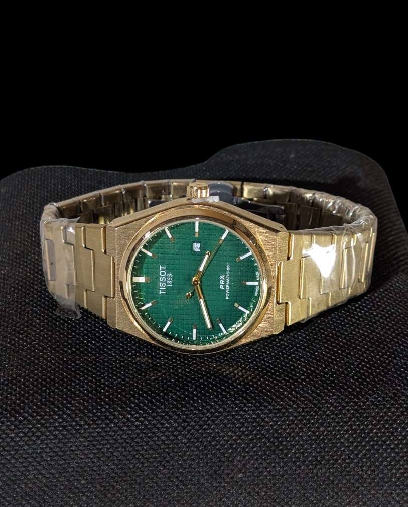 Reloj de acero TISSOT para hombres, modelo PRX Powermatic 80 automático con dial texturizado y brazalete integrado.